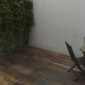 Courtyard deck in balau and bamboo screen